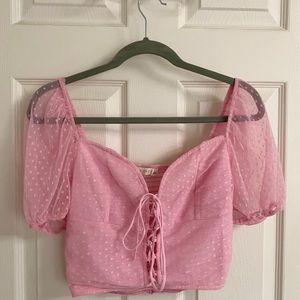 Donated

Trendy pink crop top worn once